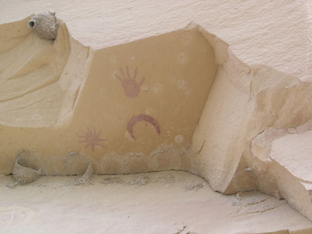 The Penasco Blanco pictograph near Chaco Canyon, New Mexico, showing a star form, crescent moon, and hand, possibly depicting the 1054 supernova