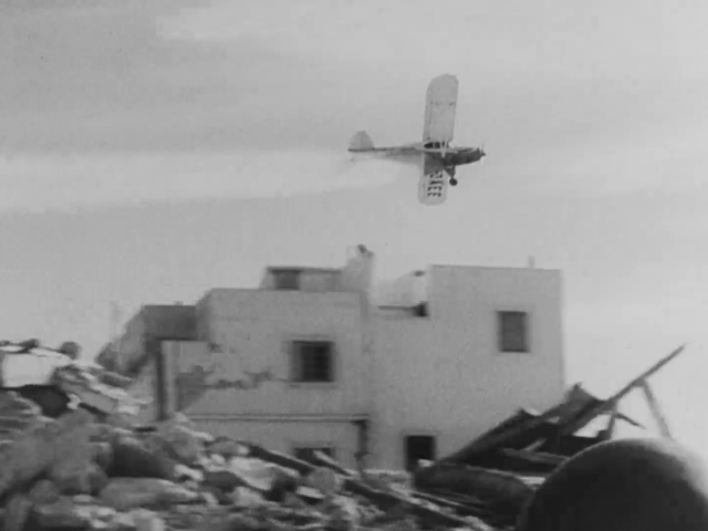 Aircraft spraying DDT over the ruins of Agadir in 1960
