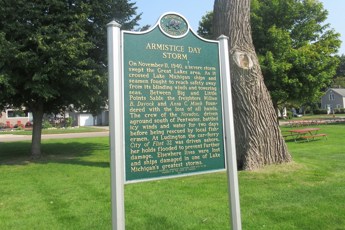 Michigan state historic marker for the Armistice Day Storm of 1940, located in Ludington
