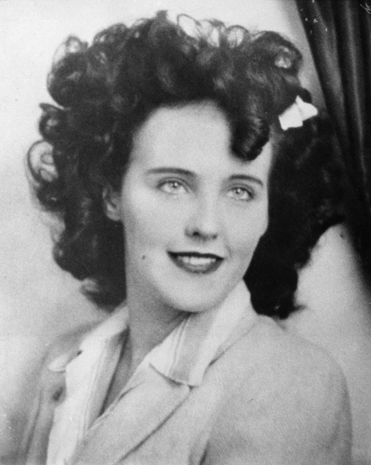 Portrait photograph of Elizabeth Short from the LAPD missing persons bulletin, 1947