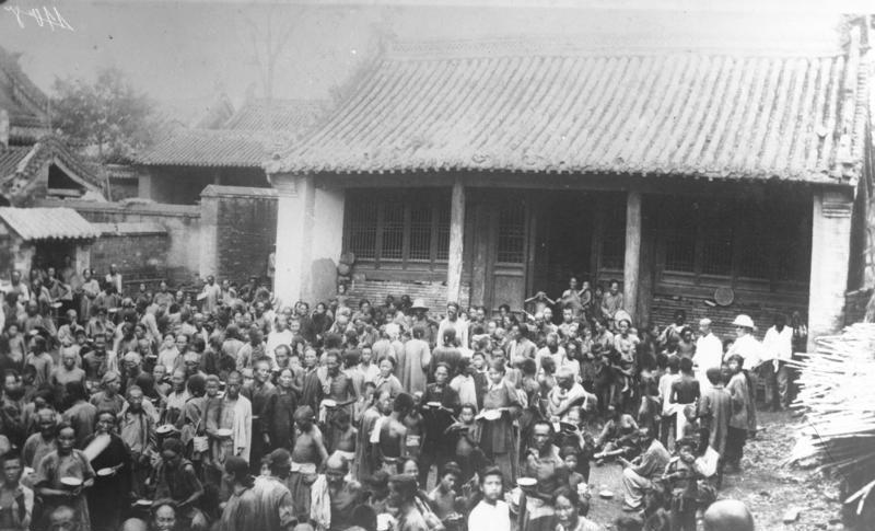 Chinese flood victims receiving aid at an International Red Cross emergency kitchen, August 1931