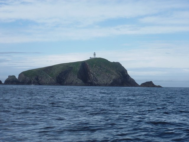 Approaching Eilean Mòr from the sea, showing the concrete access path cut into the cliff