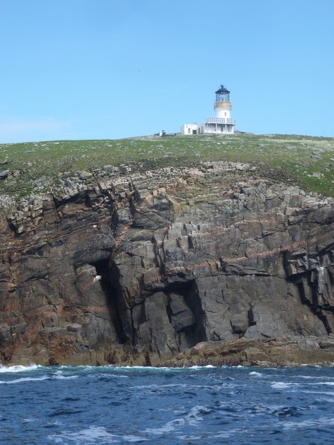The lighthouse above the sheer cliff faces of Eilean Mòr