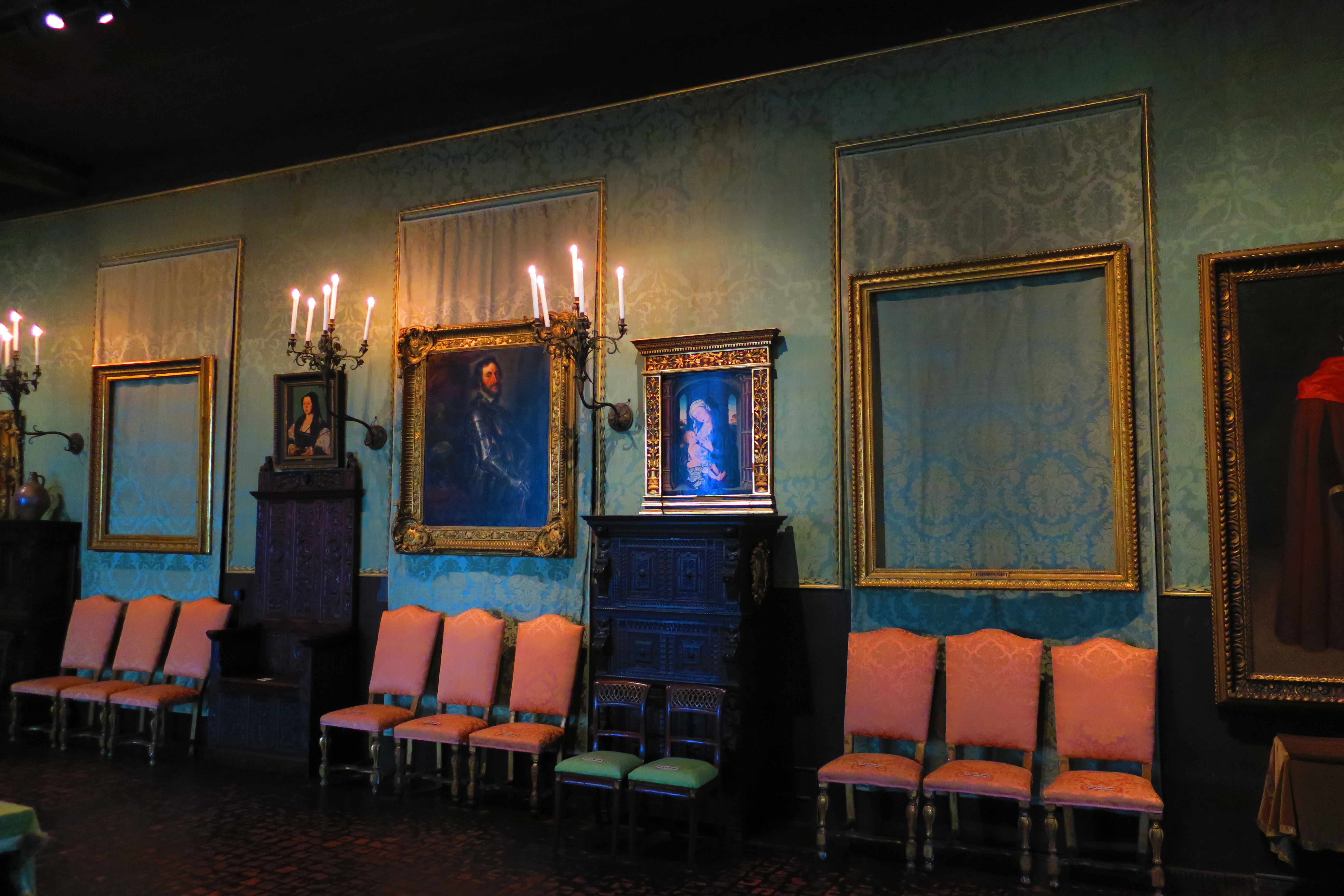 The two empty gilded frames of the stolen Rembrandt paintings hanging in the Gardner Museum Dutch Room