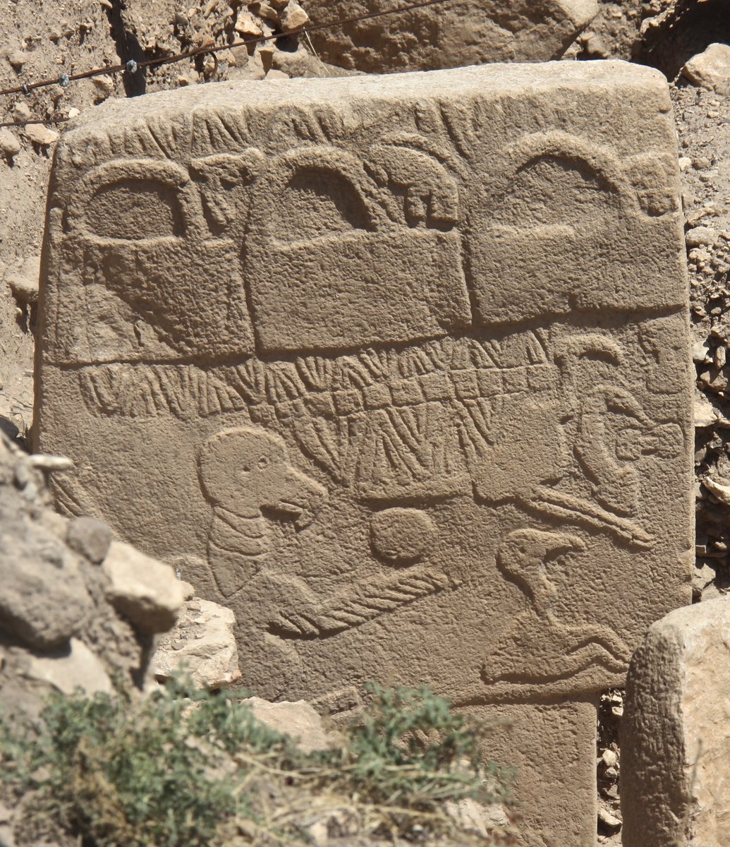 The Vulture Stone, Pillar 43 of Enclosure D at Göbekli Tepe, showing two large vultures flanking a headless human figure