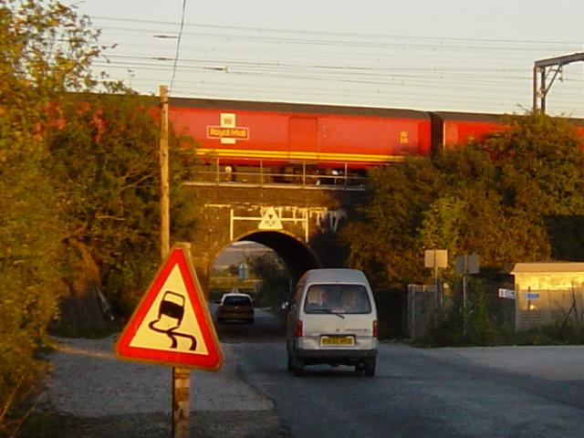A mail train crossing Bridego Bridge in 2003, near Mentmore, Buckinghamshire