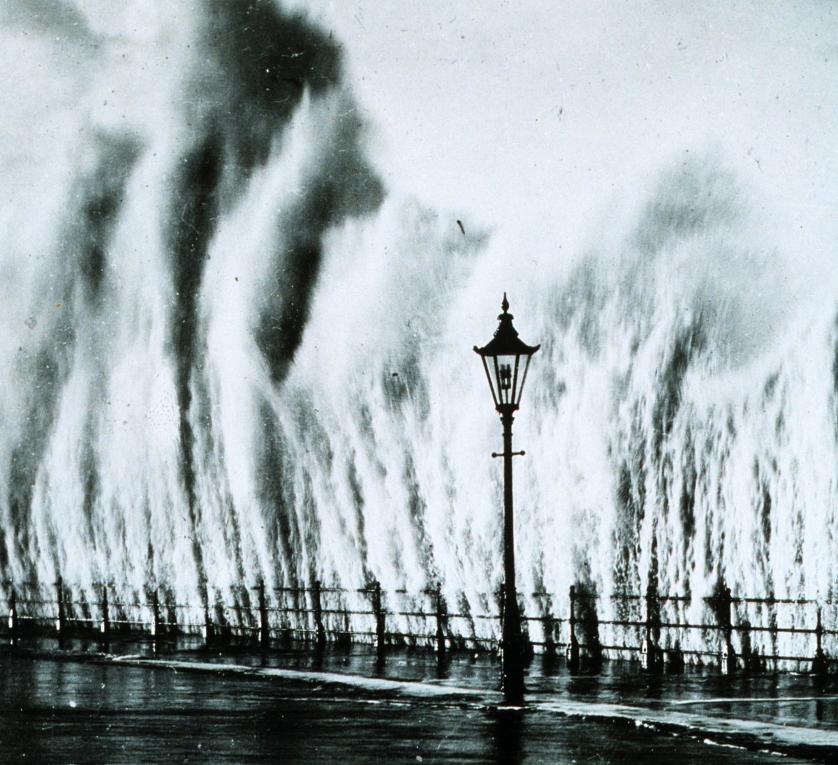 Storm surge from the 1938 hurricane striking a seawall in New England