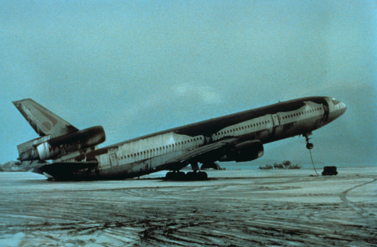A World Airways DC-10 tipped back onto its tail under the weight of wet volcanic ash at Cubi Point