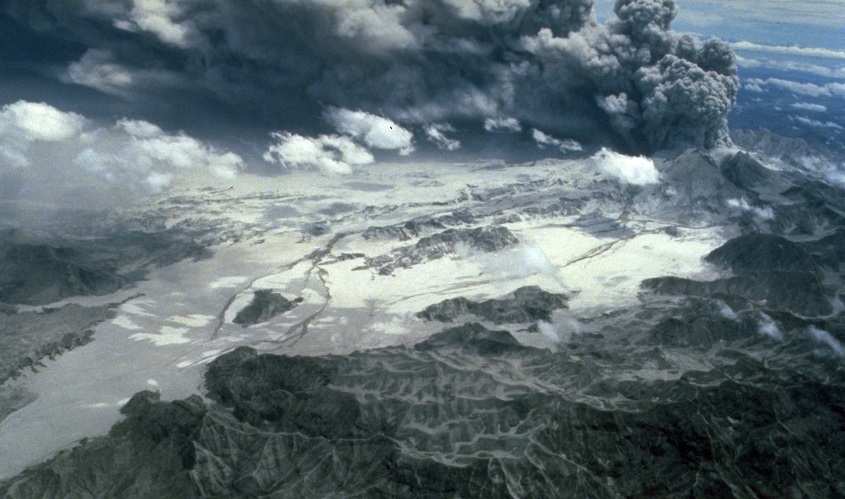 Aerial view of the Marella River valley choked with pale pyroclastic-flow deposits, June 29, 1991