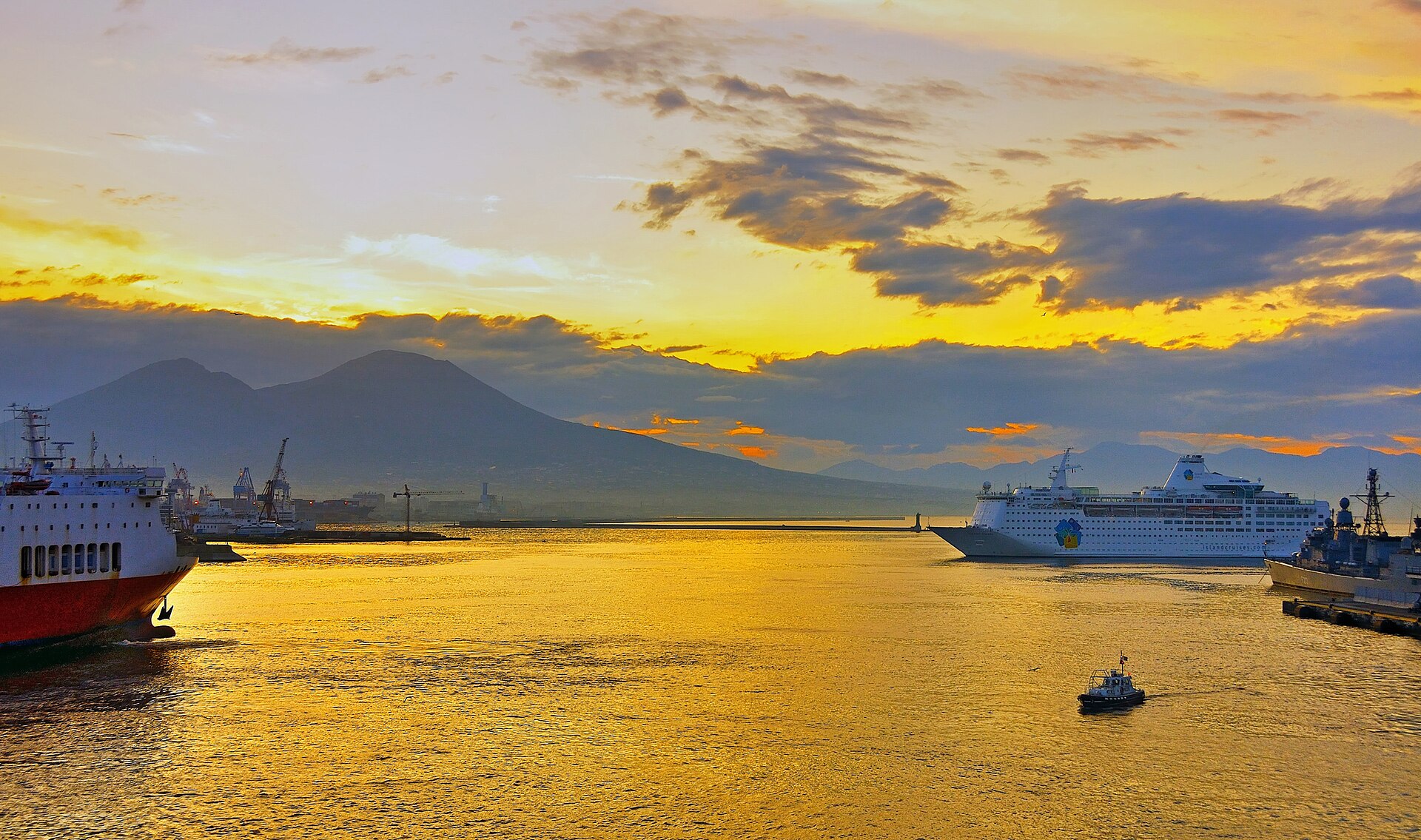 Mount Vesuvius rising over the harbor of Naples at dawn