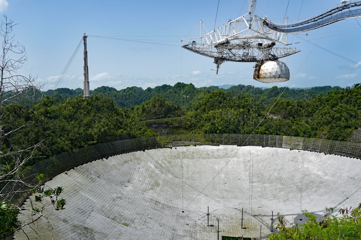 The Arecibo Observatory radio telescope dish in Puerto Rico